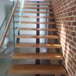 High gloss floor finish on hardwood stairs