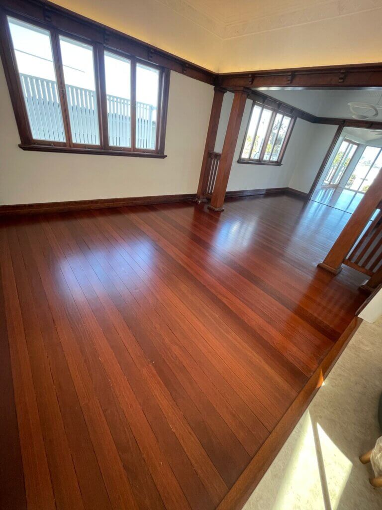 image of a newly sanded timber floor of a home lobby in brisbane
