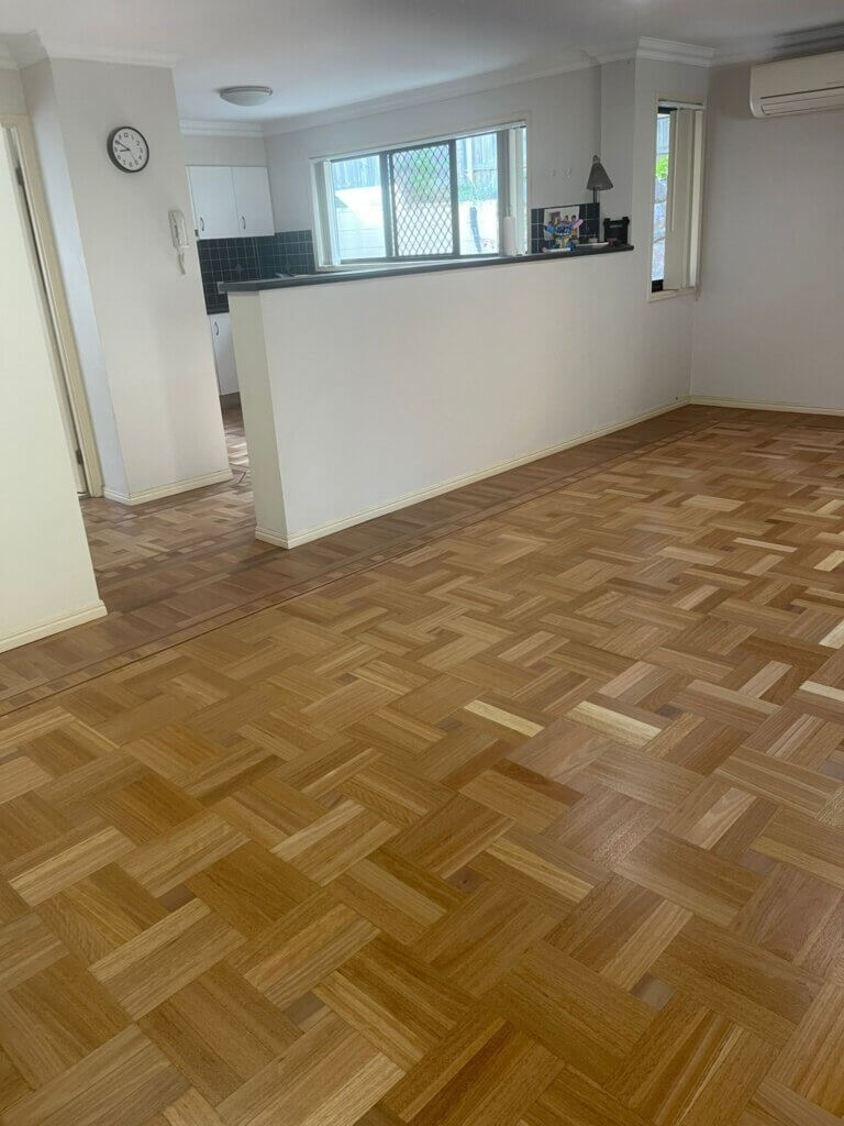 Open Plan View of Parquet Kitchen and Living Area