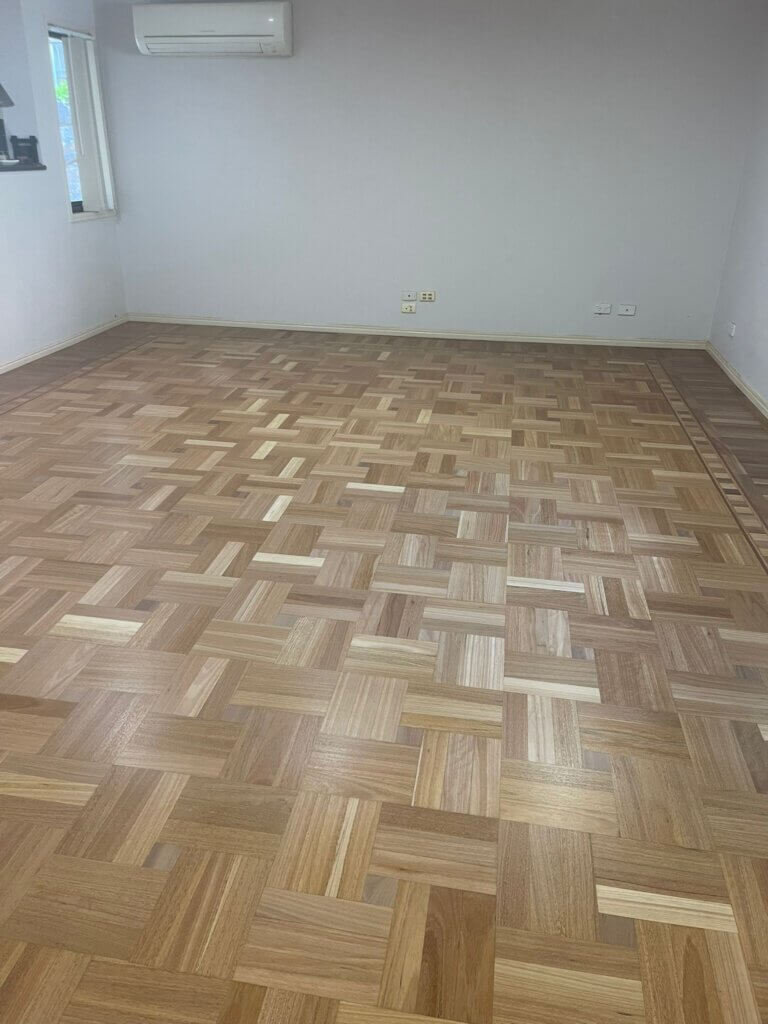Spacious Living Area with Oak Parquet Flooring